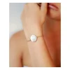 PULSERA DE CORDÓN CON DISCO GRANDE DE PLATA Y CIERRE DORADO HELENA ROHNER