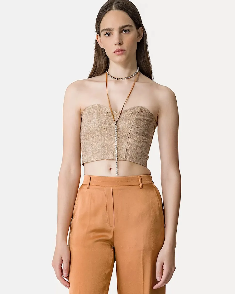top_de_bustier_en_lino_y__0.webp TOP DE BUSTIER EN LINO Y LUREX CON UN PATRÓN DE MICRO ESPIGA FORTE_FORTE