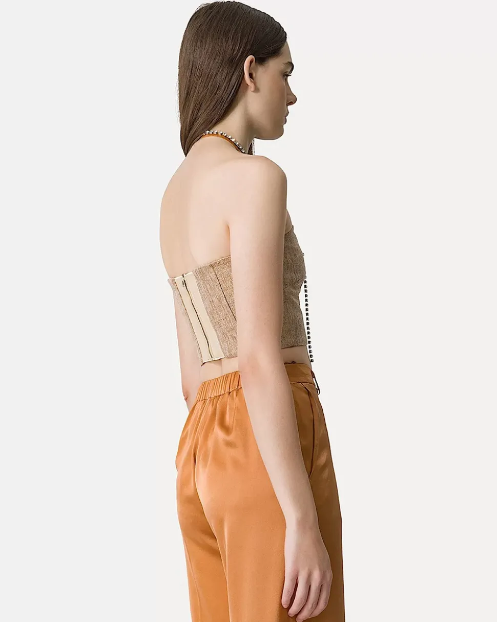 top_de_bustier_en_lino_y__1.webp TOP DE BUSTIER EN LINO Y LUREX CON UN PATRÓN DE MICRO ESPIGA FORTE_FORTE