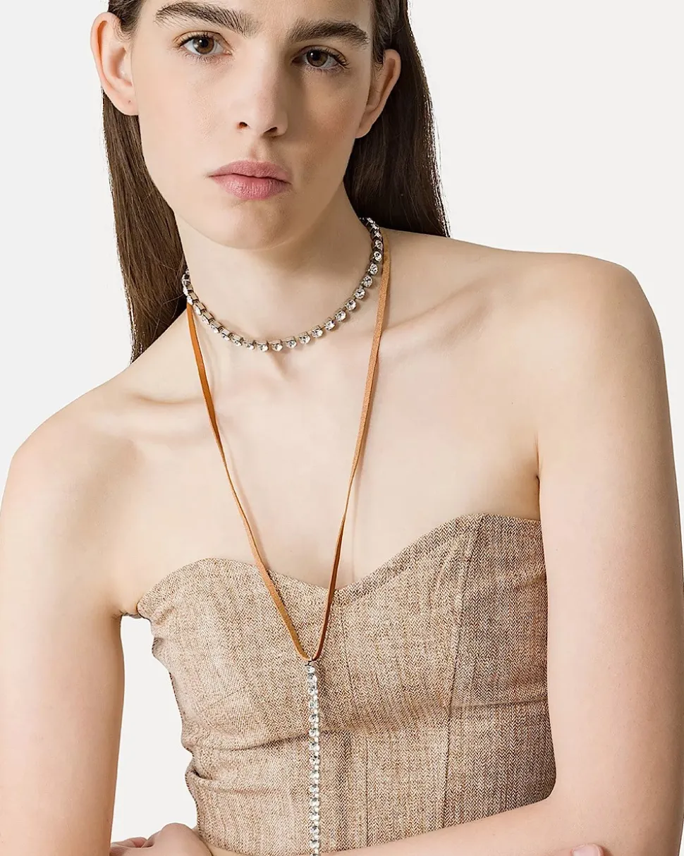 top_de_bustier_en_lino_y__2.webp TOP DE BUSTIER EN LINO Y LUREX CON UN PATRÓN DE MICRO ESPIGA FORTE_FORTE
